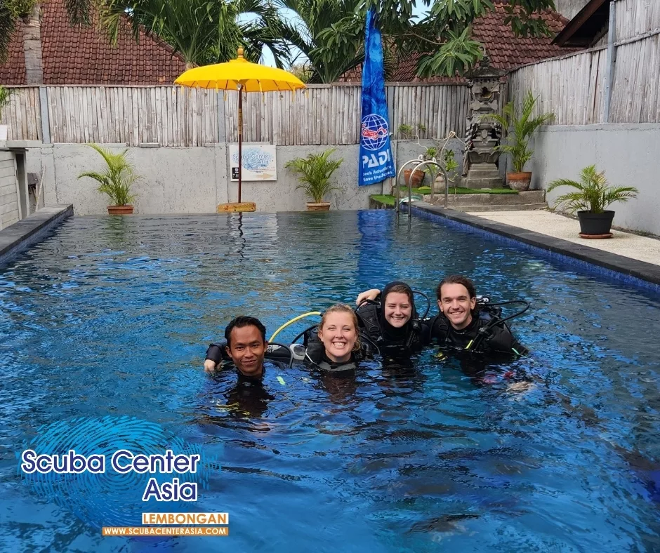 Happy divemasters in the pool